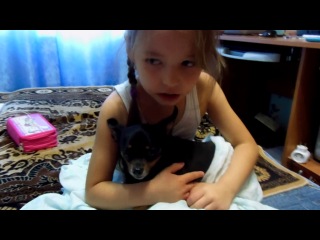 girl scolding the dog